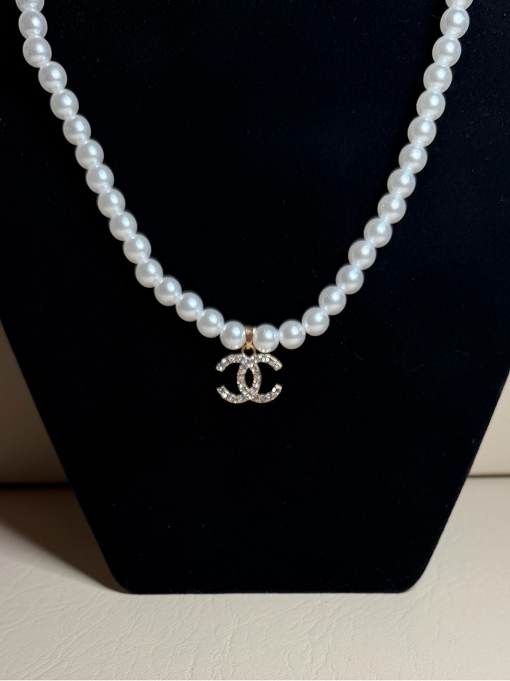 CC Lettered White Pearl Necklace with Gold Crystal Pendant